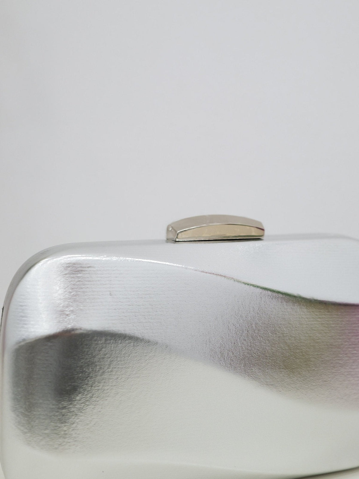 Clutch efecto ola plata