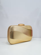 Clutch efecto ola dorado
